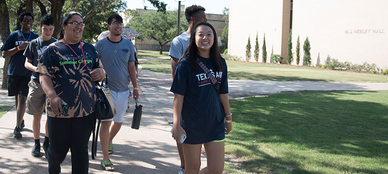 TryEngineering Summer Institute students walk across the campus of Texas A&M University, just one of the premier campuses where our summer engineering programs are offered